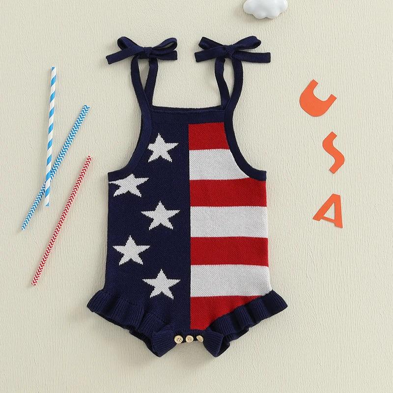 Navy red white patriotic baby romper with stars and stripes pattern, bow tie straps, and ruffle hem for infants