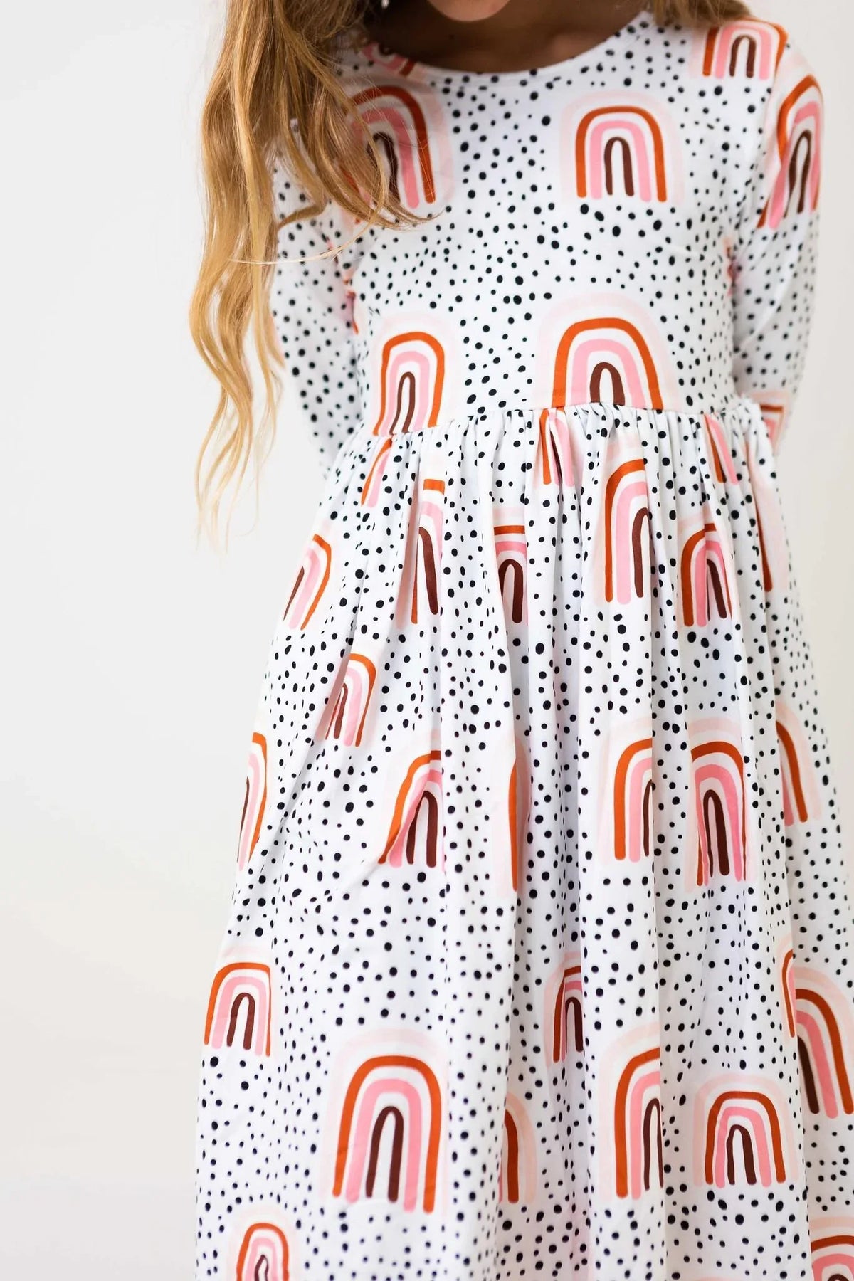 Girls 3/4 sleeve peach rainbow twirl dress with black dots by Mila Rose