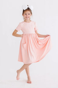 girls peach twirl dress for girls by Mila & Rose short sleeve with pockets size for young girls