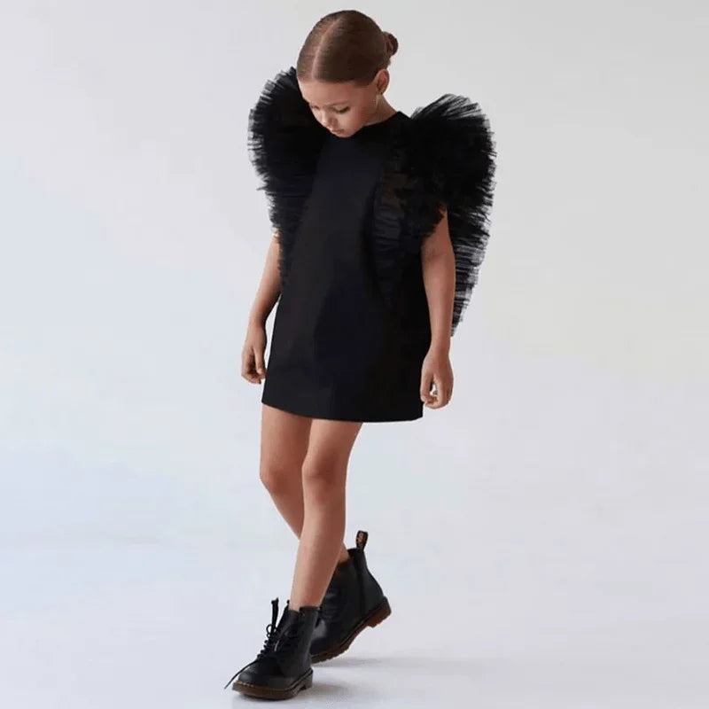 girls black party dress with ruffled tulle sleeves, toddler size, paired with black boots