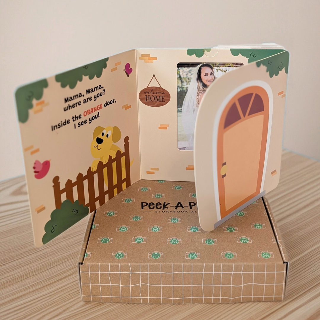 Peek a photo interactive baby board book with peach door and colorful illustrations for toddlers