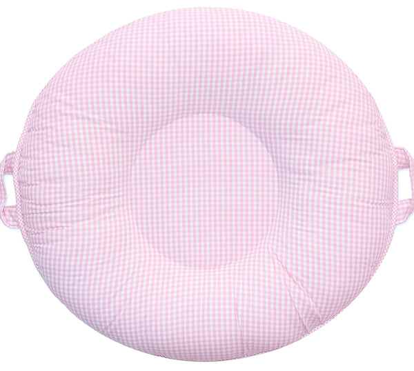 Sadie Light Pink Toddler Floor Cushion, round checkered fabric with side handles.