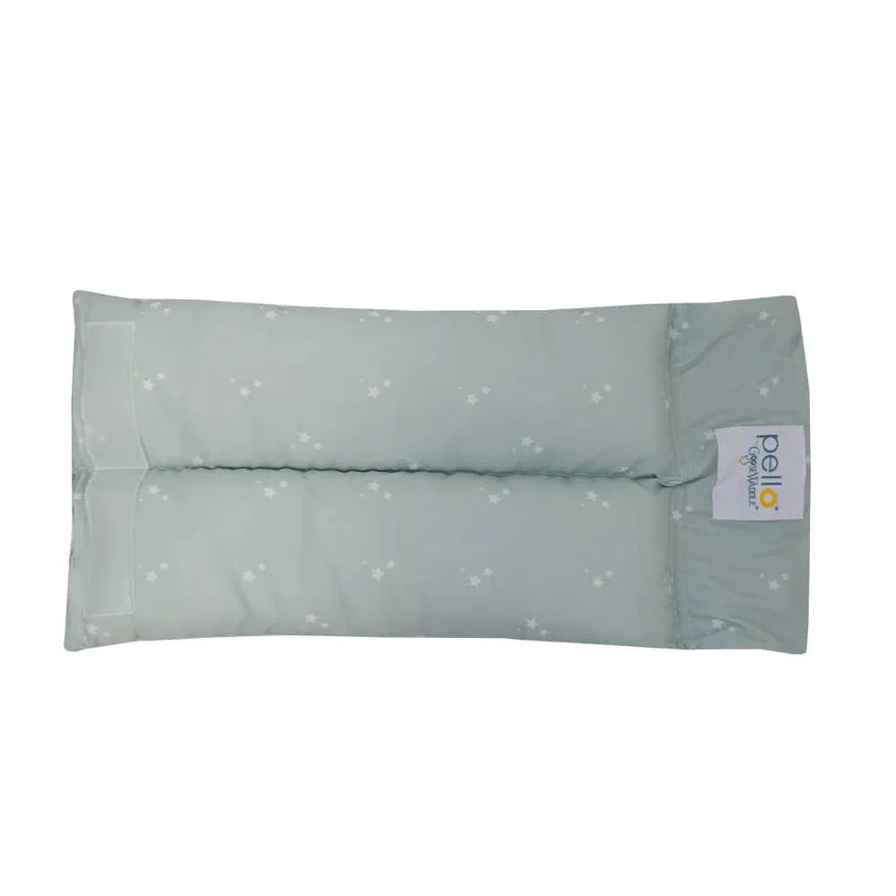 light green newborn nursing pillow with small white floral pattern and soft cushioning