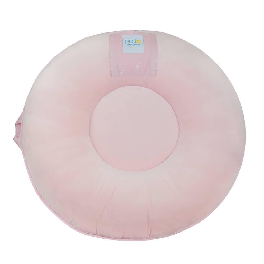 Pink floor cushion for toddlers made of soft plush fabric with round shape for comfortable seating