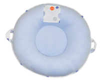 Light blue cotton toddler floor cushion with round shape and side handles for easy carrying