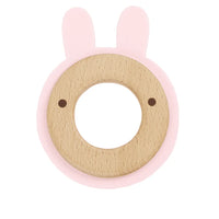 Pink bunny baby teether with wooden center and soft pink silicone edges