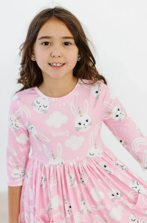 Girls pink bunny girls twirl dress with 3/4 sleeves and playful bunny print
