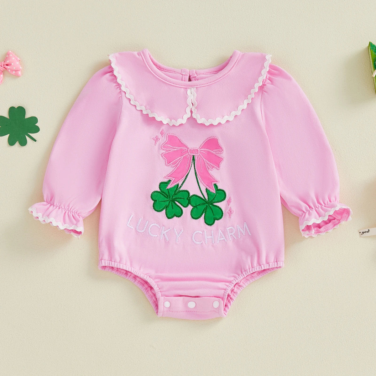 Lucky Charm Pink embroidered baby bubble romper made of soft cotton with long sleeves and scalloped collar