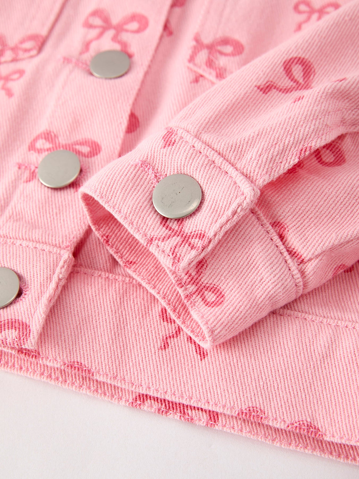 Girls pink butterfly denim jacket with silver snap buttons from Rylee Faith Designs