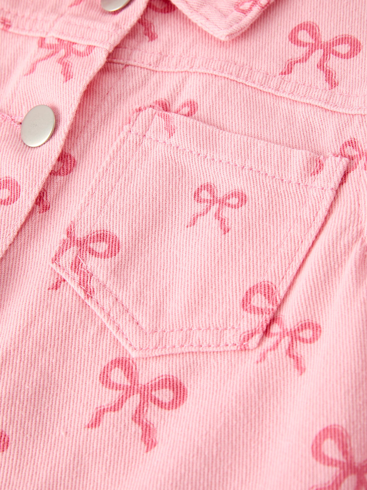 Pink girls butterfly denim jacket with long sleeves and bow print detail for toddlers
