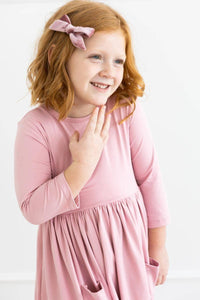 Pink girls twirl dress with pockets by Mila Rose, 3/4 sleeve, toddler size with soft fabric