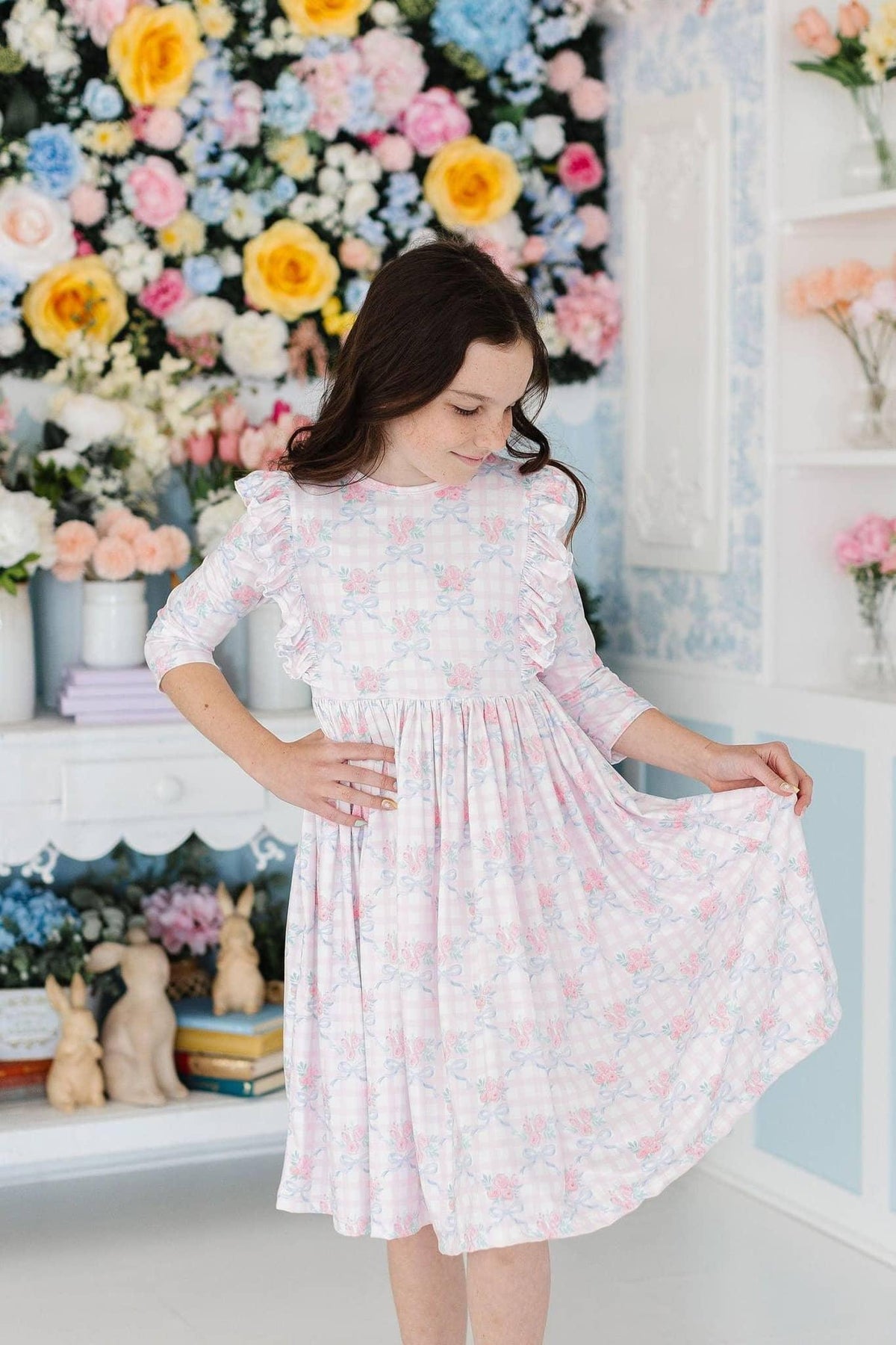 Girls light pink ruffle twirl dress for girls with 3/4 sleeves and floral pattern by Mila & Rose