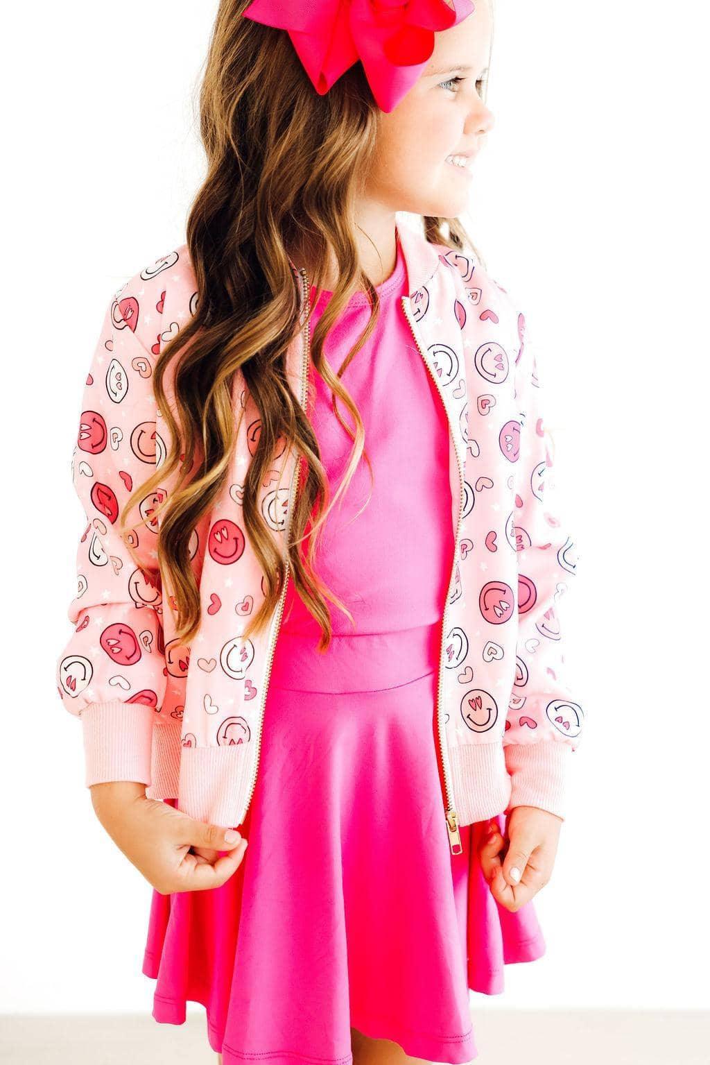 Girls pink satin jacket with smiley face print and zipper closure, size suitable for young children