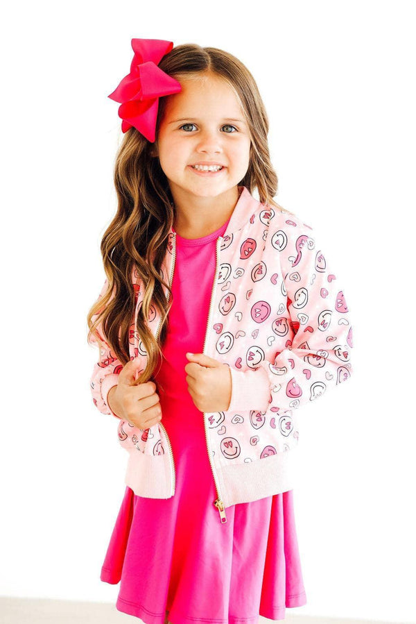 Girls pink satin jacket with smiley face pattern and zipper by Mila & Rose