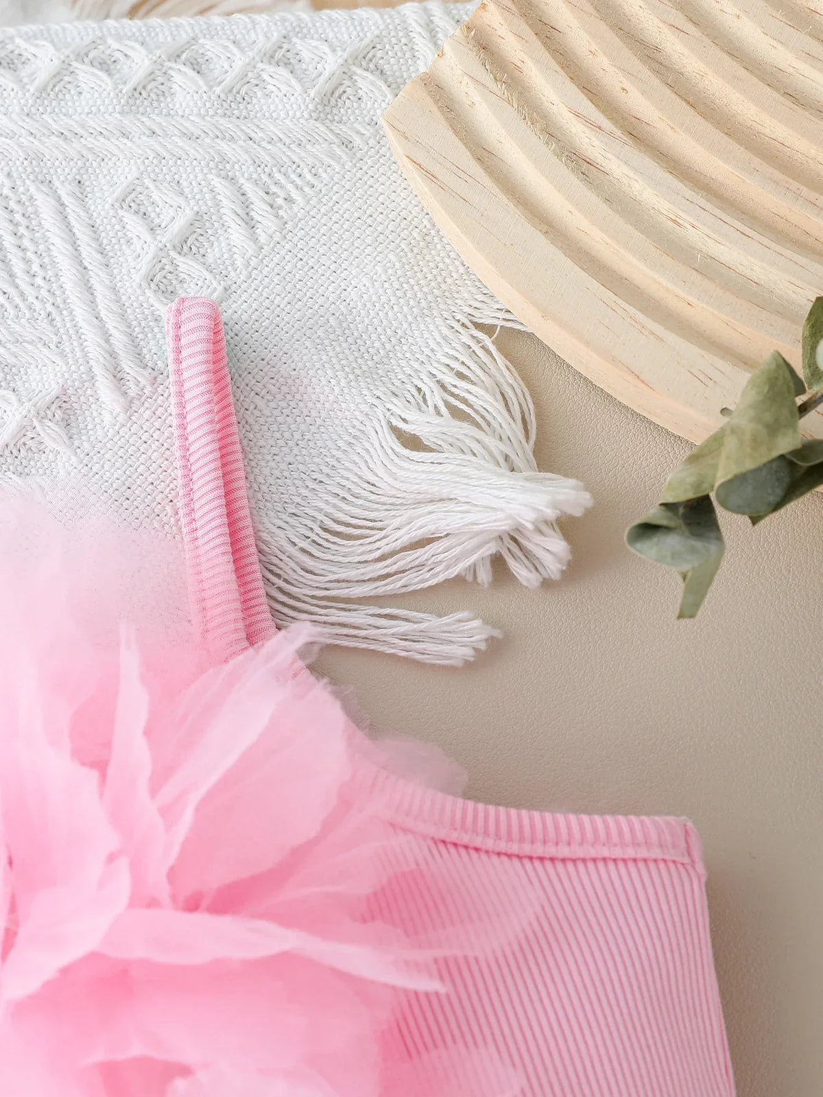 Girls pink shorts set with spaghetti straps and large flower detail for toddlers