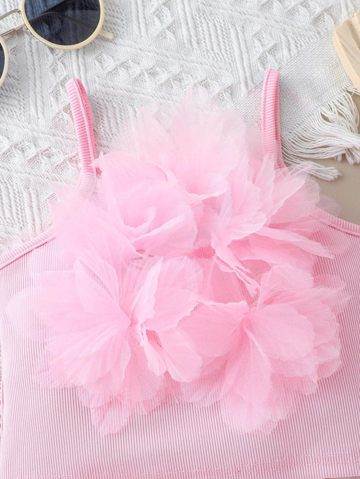toddler pink shorts set with large fluffy flower detail on sleeveless top