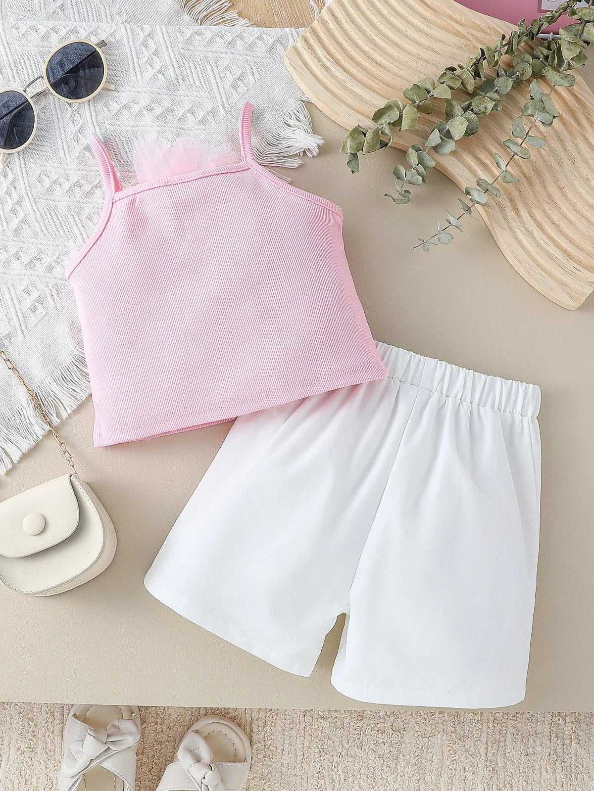 Toddler girls pink shorts set with sleeveless pink top and white elastic shorts