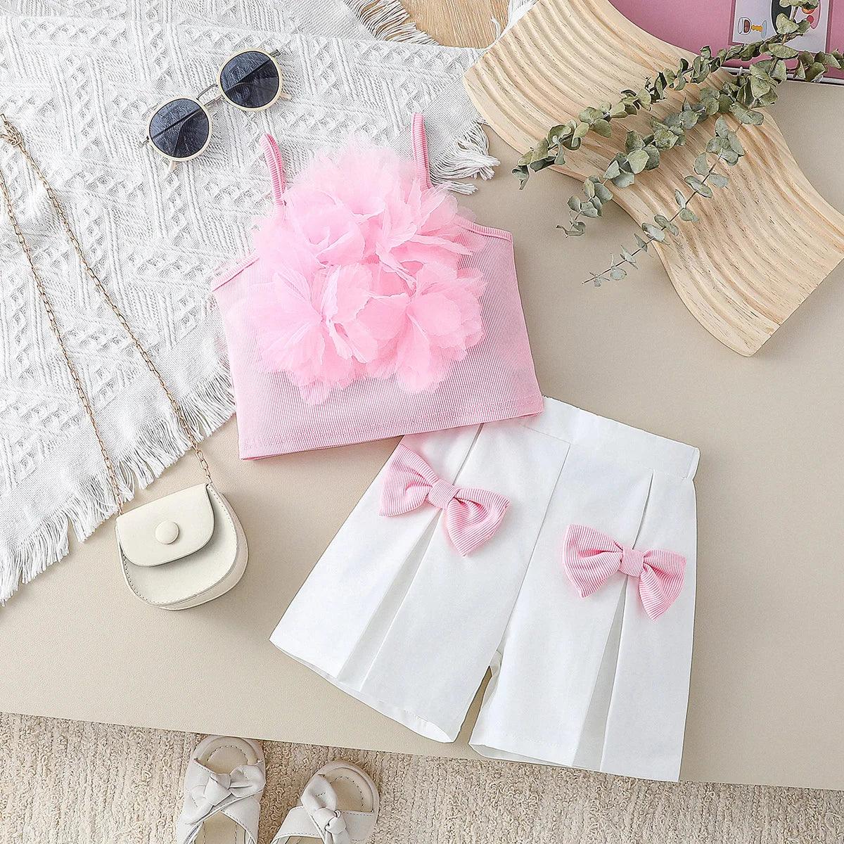 toddler girls pink shorts set with pink ruffle tank top and white shorts with pink bows