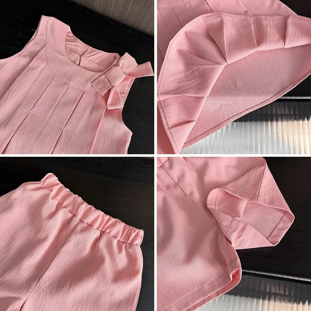 baby girls pink shorts set with sleeveless top and bow detail, elastic waist shorts