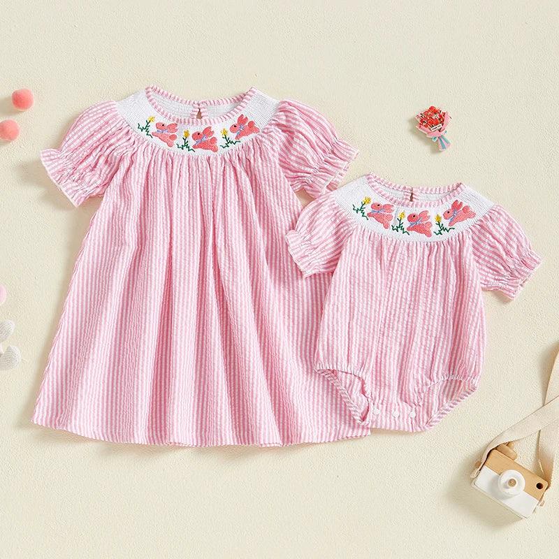 pink striped baby romper with floral embroidery and puff sleeves for infants
