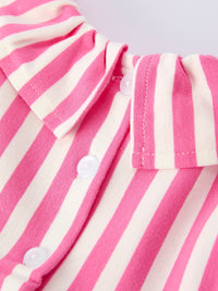 Close-up of pink striped girls dress with hat showing white buttons and collar detail by Rylee Faith Designs