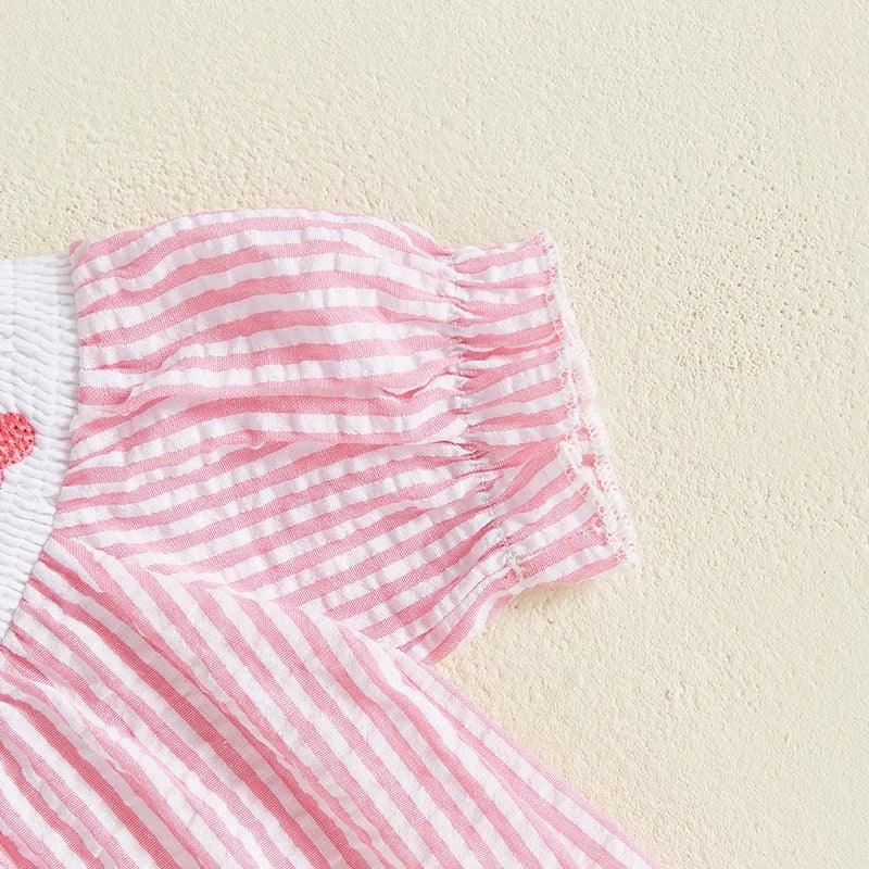 baby girls pink and white striped romper with puff sleeves and smocked details