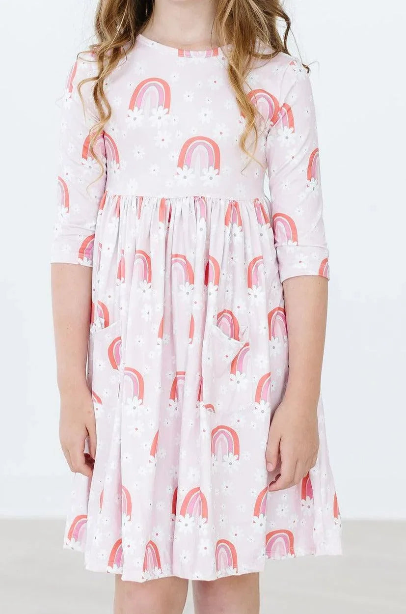 Girls pink twirl dress for girls with 3/4 sleeves and rainbow pocket design
