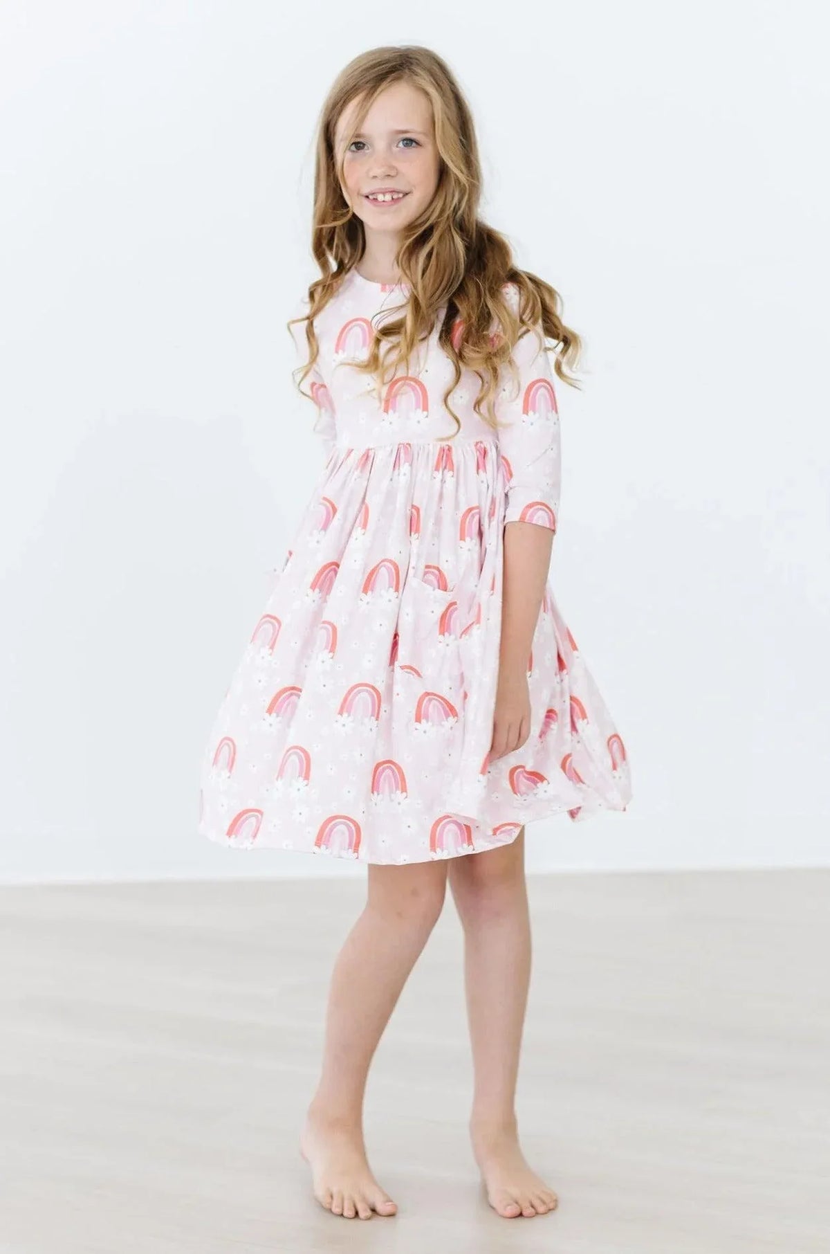 Girls pink twirl dress for girls with 3/4 sleeves and rainbow print, size for young girls