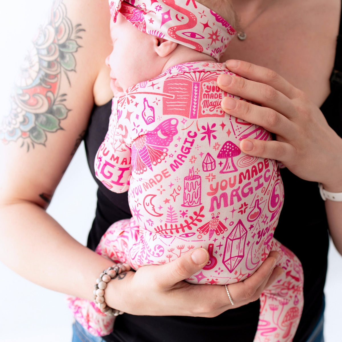 The Second-Skin Bamboo Zippered Footie | Mystic Mama features convenient two-way zipper, ideal for quick diaper changes.