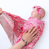 The Forever Large Swaddle Blanket | Mystic Mama used as a stroller cover, highlighting its multi-use as a large swaddle blanket.