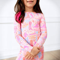 The Second-Skin 2-Piece Long Sleeve Pajama Saddle Up: pastel cowgirl print for girls.