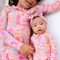 The Second-Skin 2-Piece Long Sleeve Pajama Saddle Up; pastel cowgirl print worn by mom and baby.