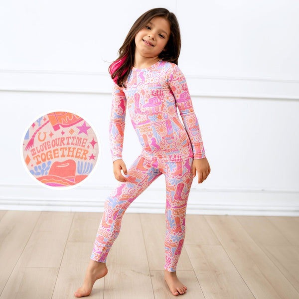 The Second-Skin 2-Piece Long Sleeve Pajama Saddle Up print for girls, pink cowgirl design.