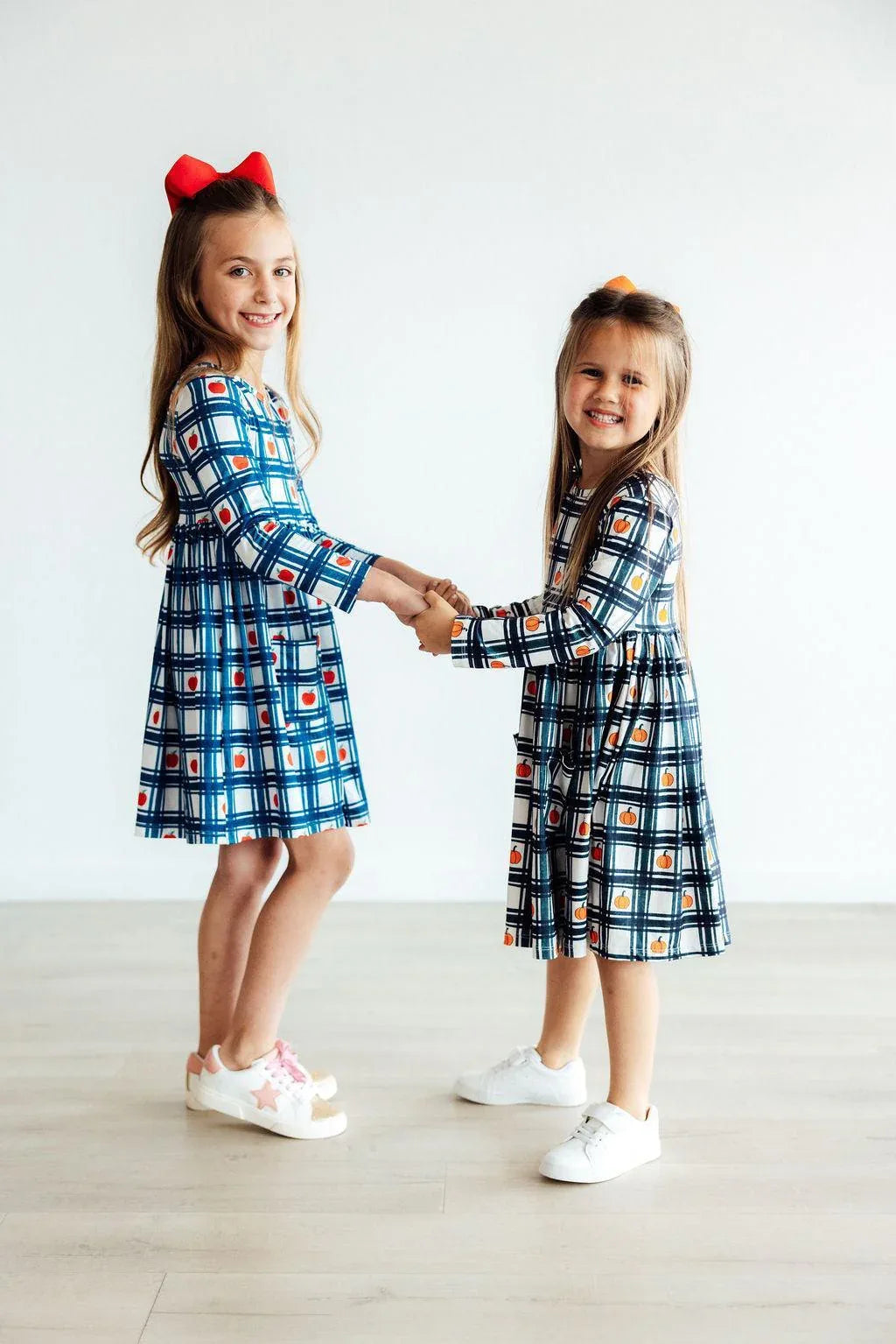 Girls long sleeve plaid apple dress for girls with pockets, ages 4 and 6, blue and black color options