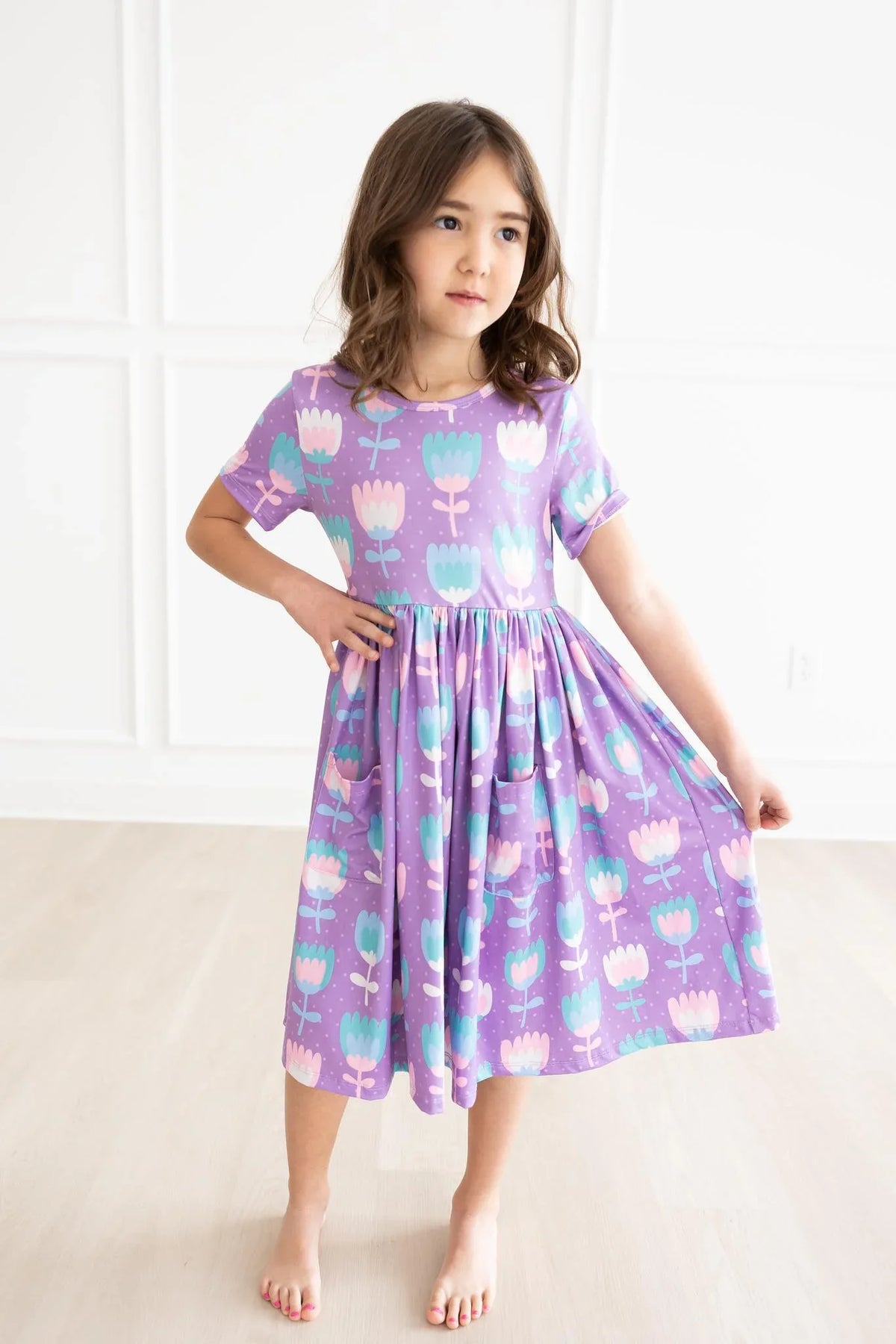 Girls purple pocket girls twirl dress with short sleeves and floral pattern 