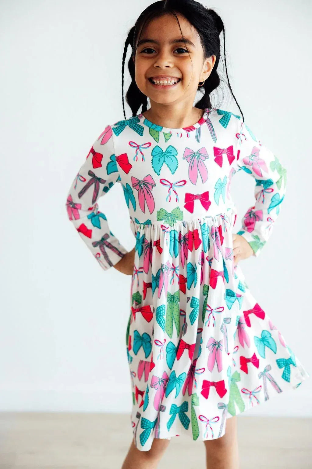 Girls long sleeve pocket twirl dress for girls white with colorful bow print