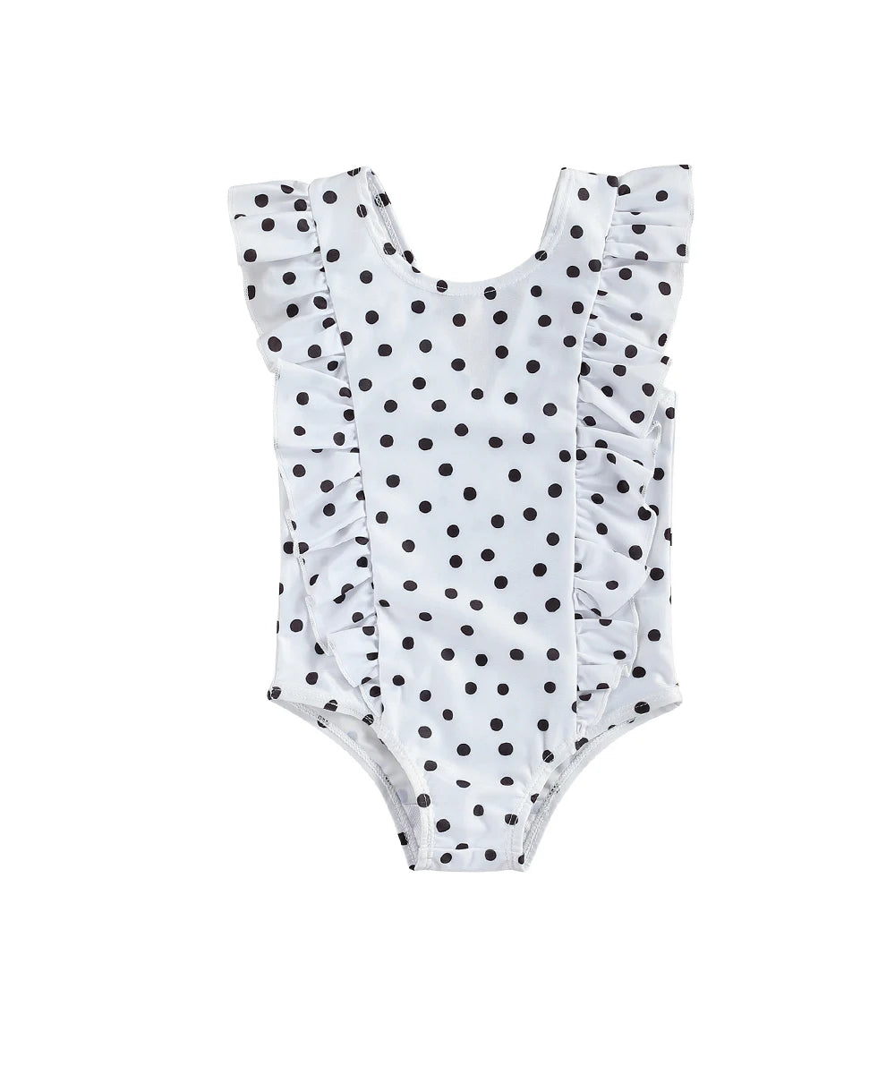 White polka dot girls swimsuit with black dots and ruffled sleeves for toddlers
