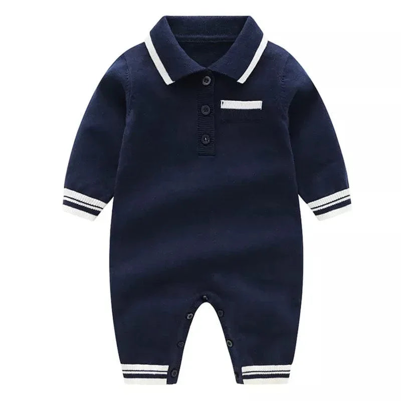 Navy blue preppy knit romper for babies with white collar and cuff stripes, long sleeve