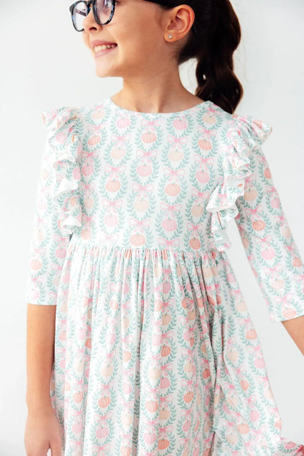 Girls pumpkin fall dress for girls by Mila Rose long sleeve twirl ruffle dress with pink pumpkin pattern