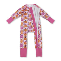 pumpkin floral baby romper for infants with orange and purple pumpkin print and pink cuffs