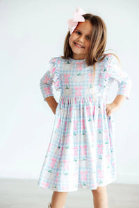 Girls blue and pink pumpkin picnic twirl dress for girls with 3/4 sleeves and ruffle details