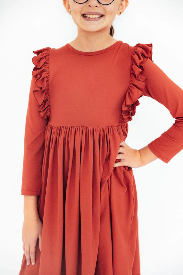 Girls pumpkin spice twirl ruffle dress long sleeve in fall orange with ruffle details