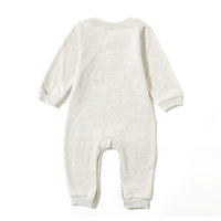 cream-colored rainbow baby romper for infants with long sleeves and cuffed ankles