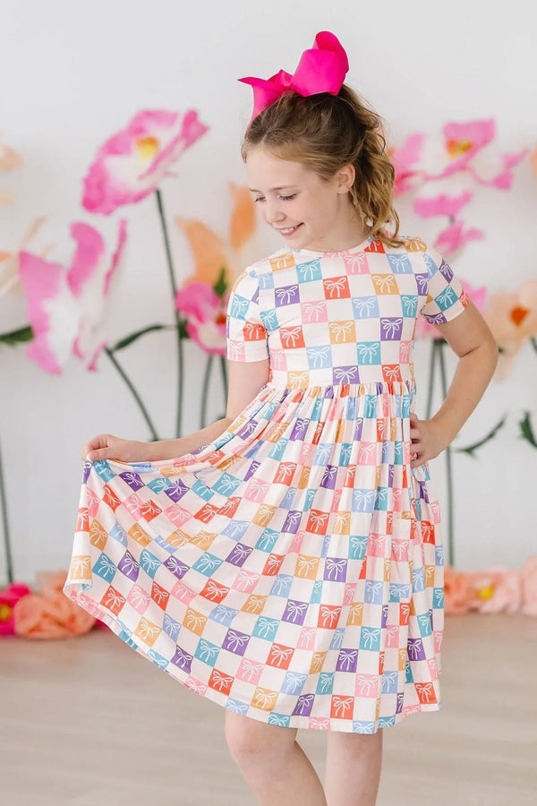Girls short sleeve rainbow twirl dress for girls with colorful square pattern and gathered waist