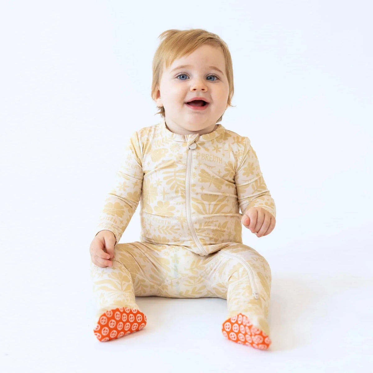 Raising Mama Beige Baby Footie Onesie with Floral Print - The Palm Beach Baby