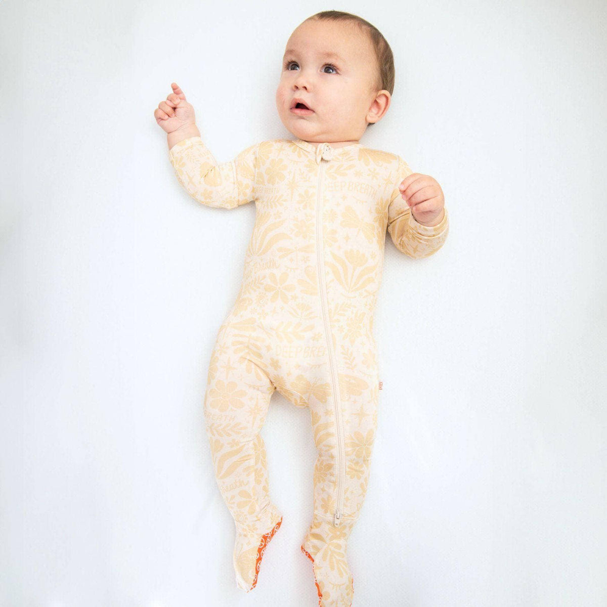 Raising Mama Beige Baby Footie Onesie with Floral Print - The Palm Beach Baby