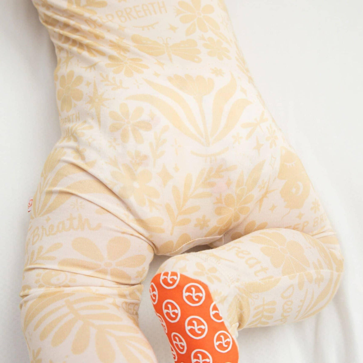 Raising Mama Beige Baby Footie Onesie with Floral Print - The Palm Beach Baby
