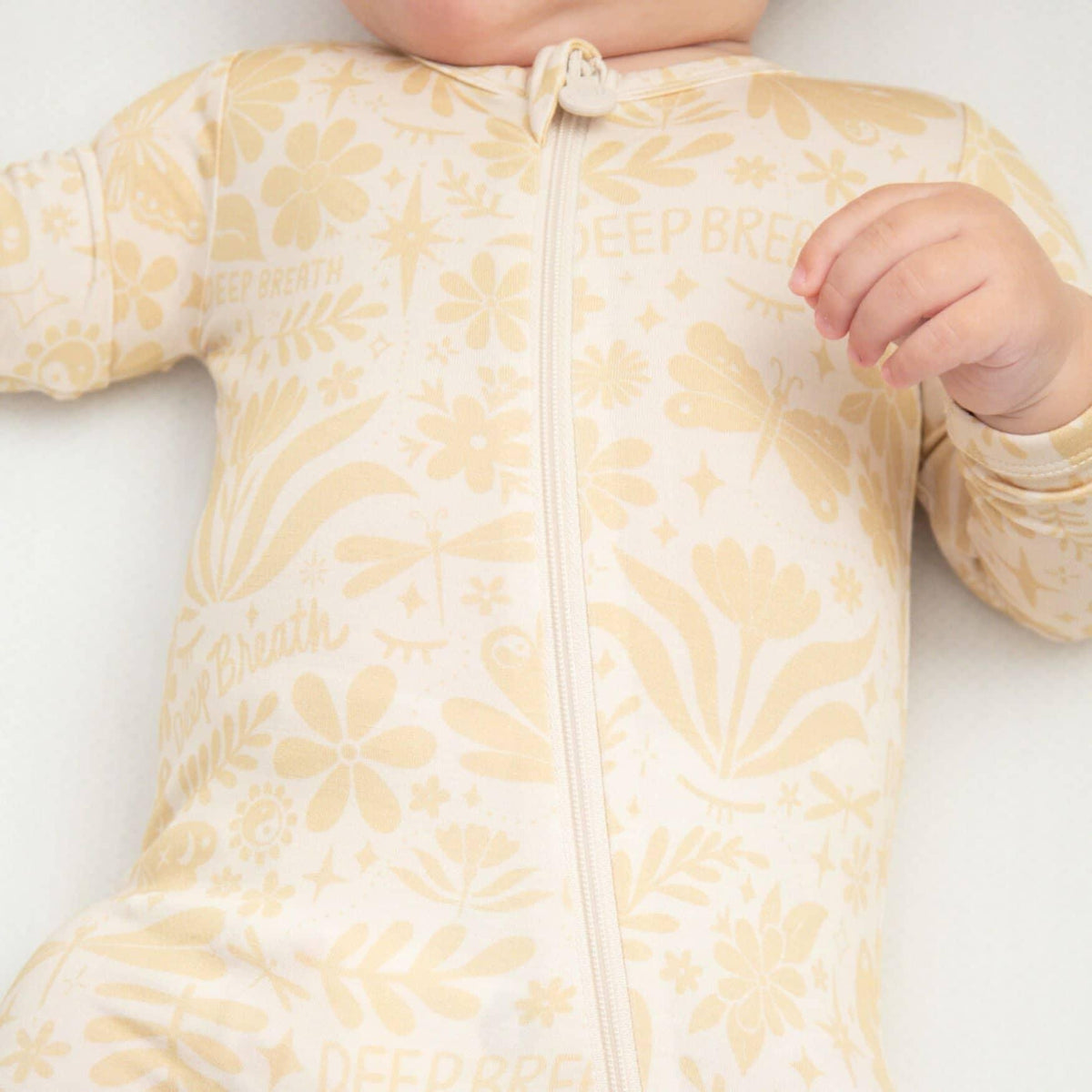 Raising Mama Beige Baby Footie Onesie with Floral Print - The Palm Beach Baby