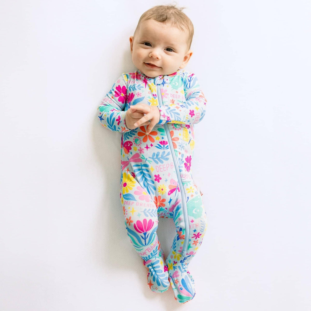 Raising Mama Light Blue Baby Footie Pajamas with Floral Print - The Palm Beach Baby