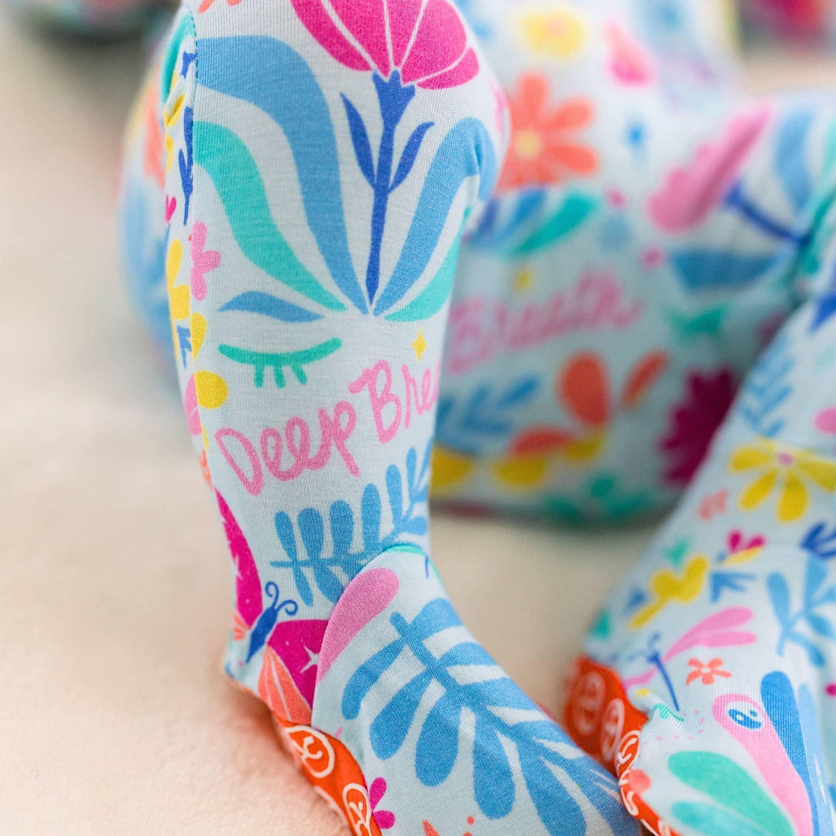 Raising Mama Light Blue Baby Footie Pajamas with Floral Print - The Palm Beach Baby
